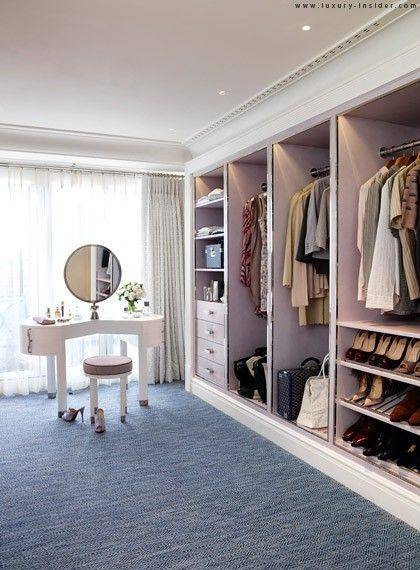 35-spare-bedrooms-that-turned-into-dream-closets-turn-room-into-walk-in-closet-walk-in-closet-with-blue-rug-572fae594bf0acca5a4137f2-w620_h800